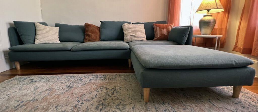 My sectional (sofa, corner, and ottoman) with wooden legs attached 