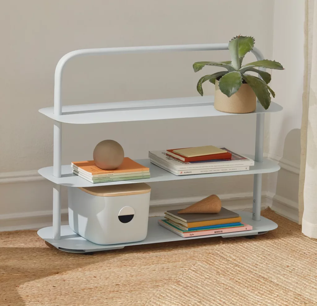 The open spaces rack in cream color, set in the corner of a room